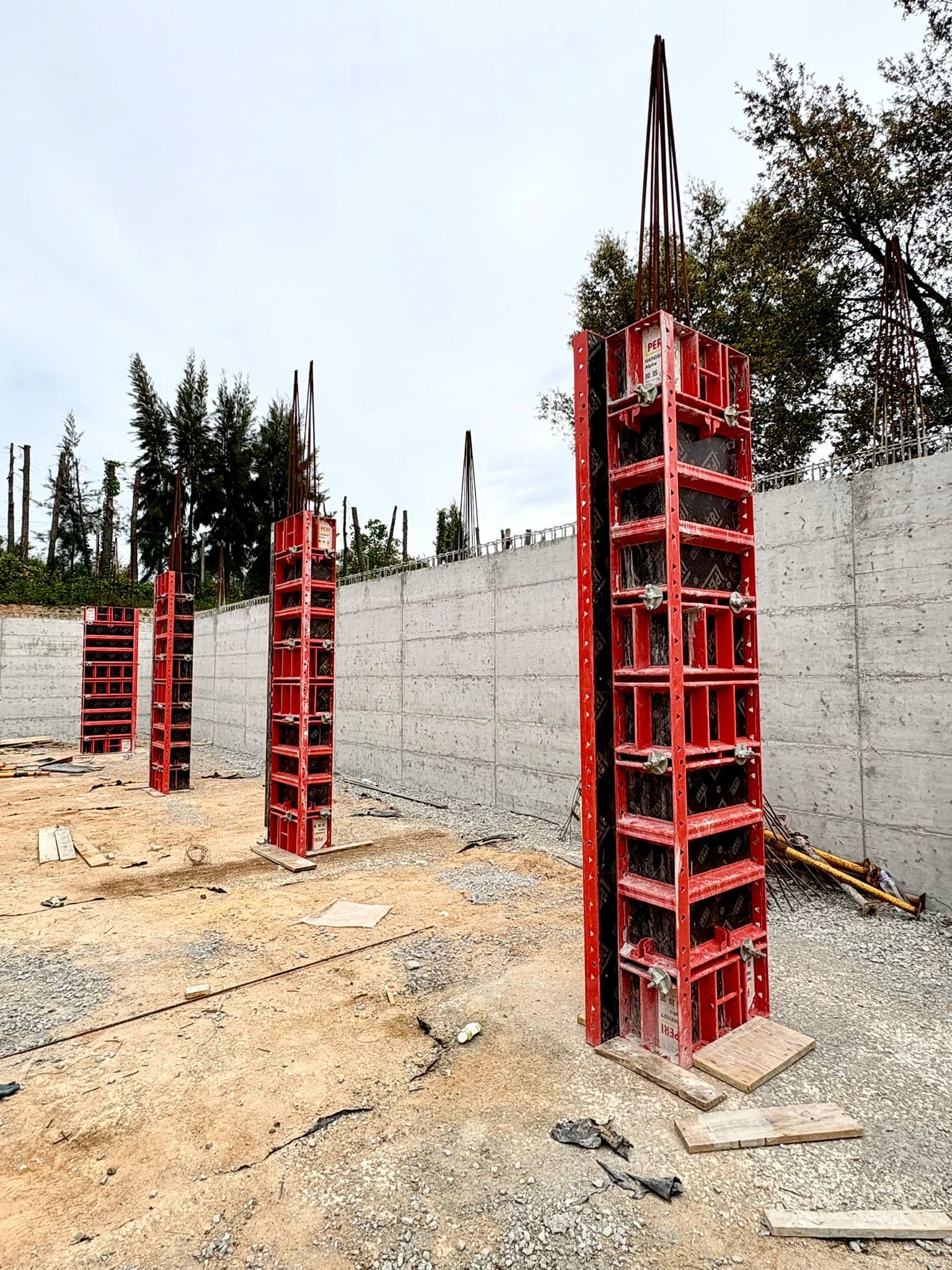 Workers assembling formwork panels