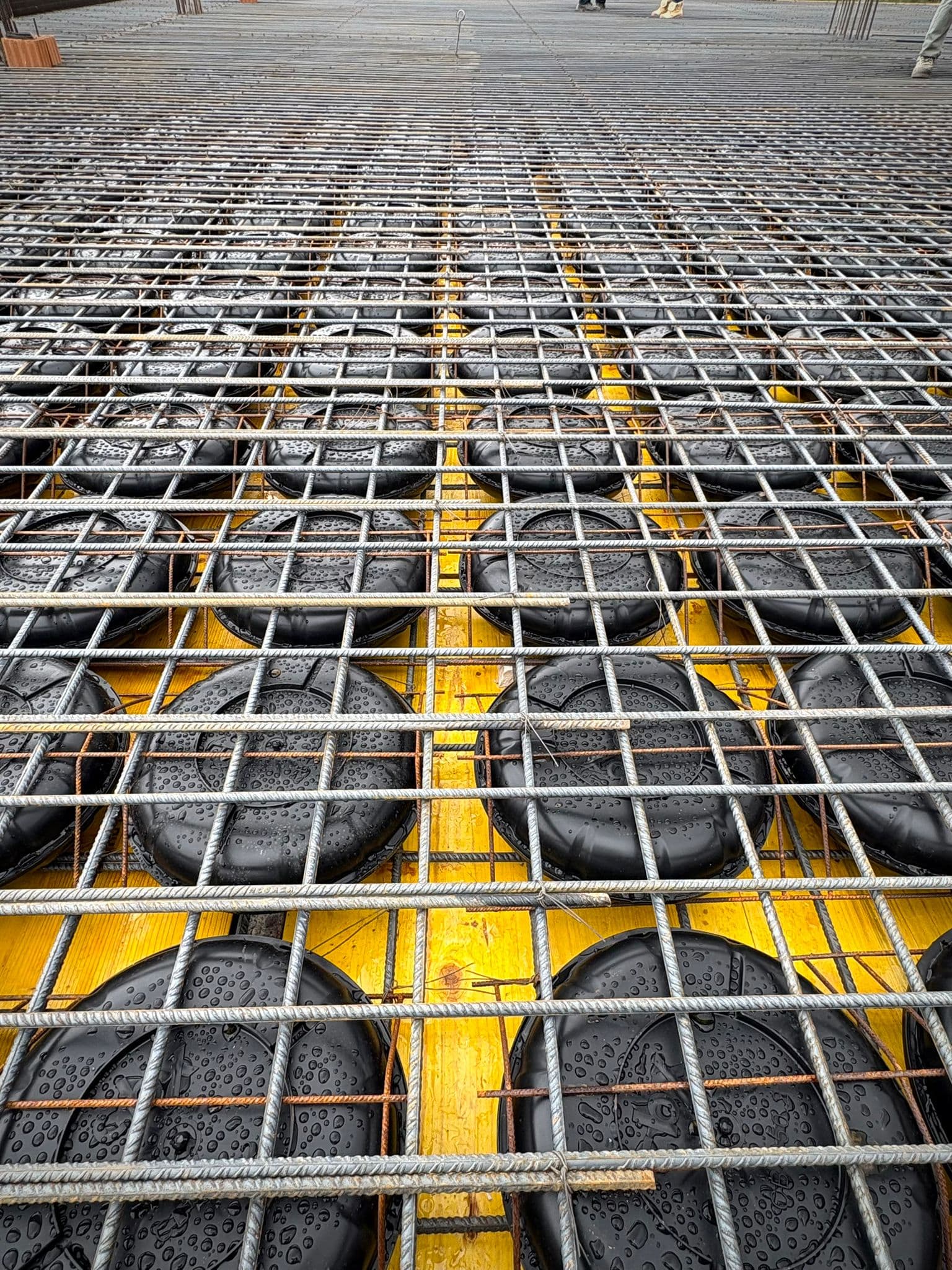 Workers assembling formwork panels