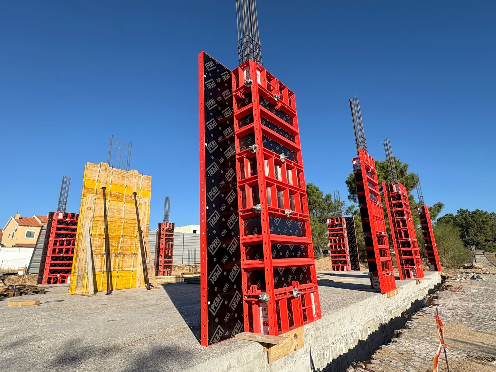 Workers assembling formwork panels