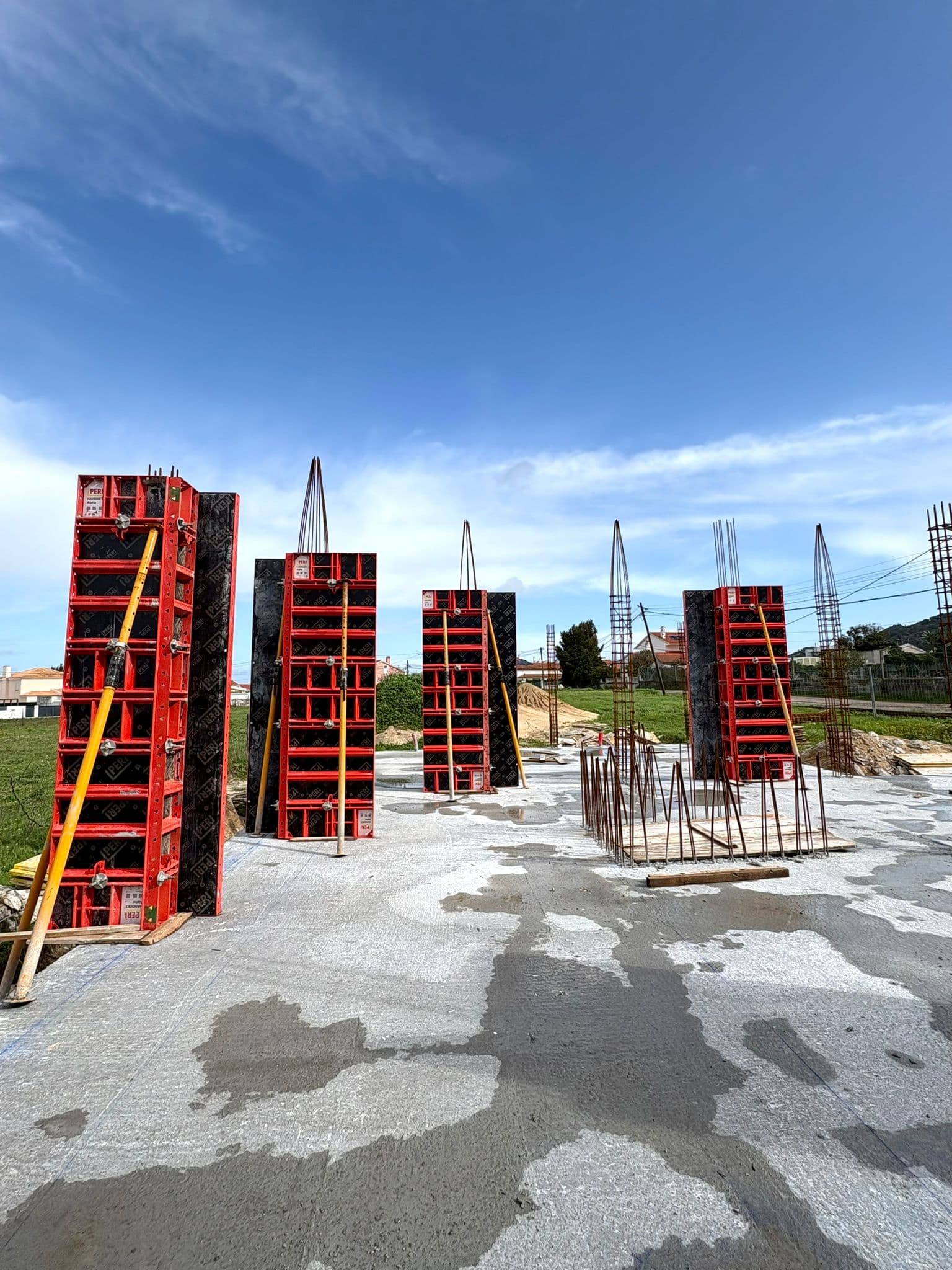 Workers assembling formwork panels